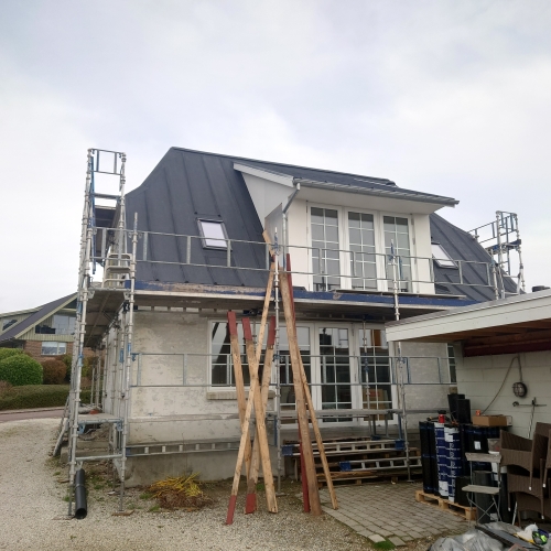 Flot tagpap listedækning på hus i Faaborg på Fyn