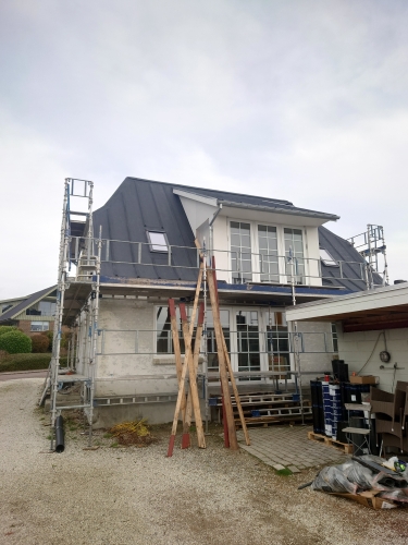 Flot tagpap listedækning på hus i Faaborg på Fyn